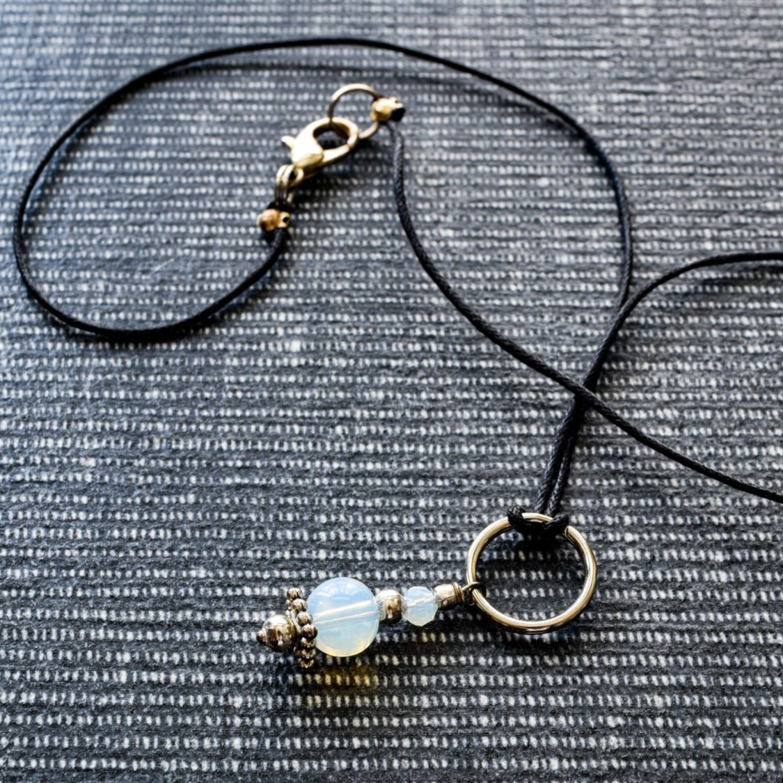 Expressions in Opalite Pendent on a Black Cord