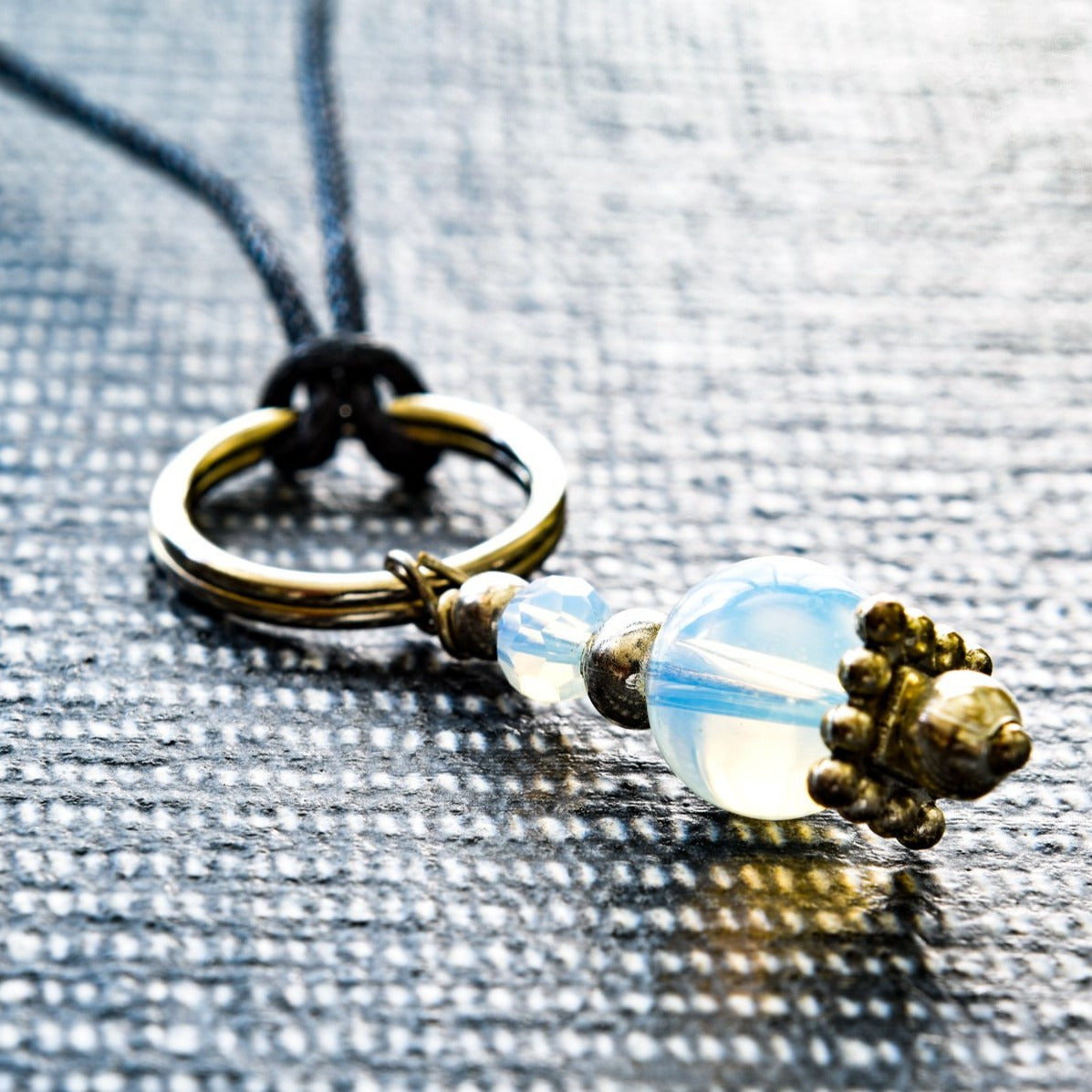 Expressions in Opalite Pendent on a Black Cord