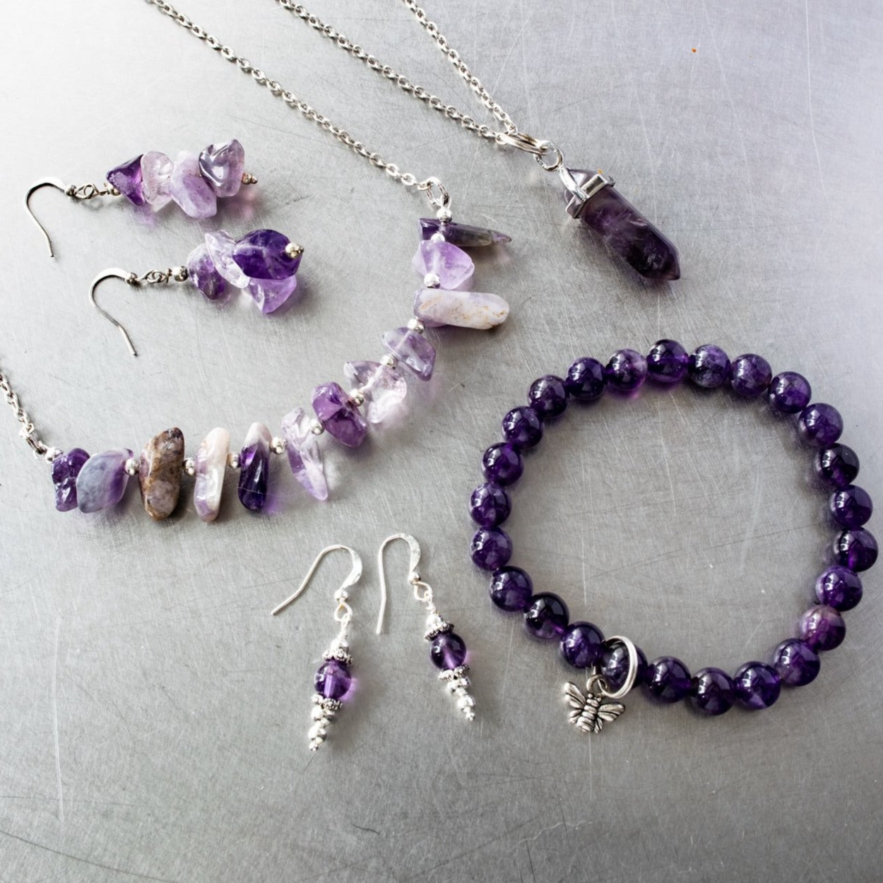 Expressions in Amethyst, 24-inch Necklace with a Amethyst Pendant on a Stainless-Steel Chain