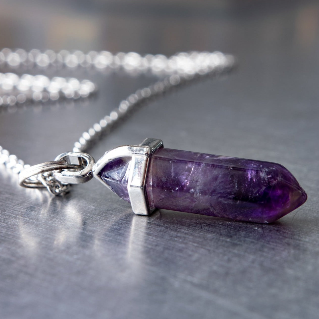 Expressions in Amethyst, 24-inch Necklace with a Amethyst Pendant on a Stainless-Steel Chain