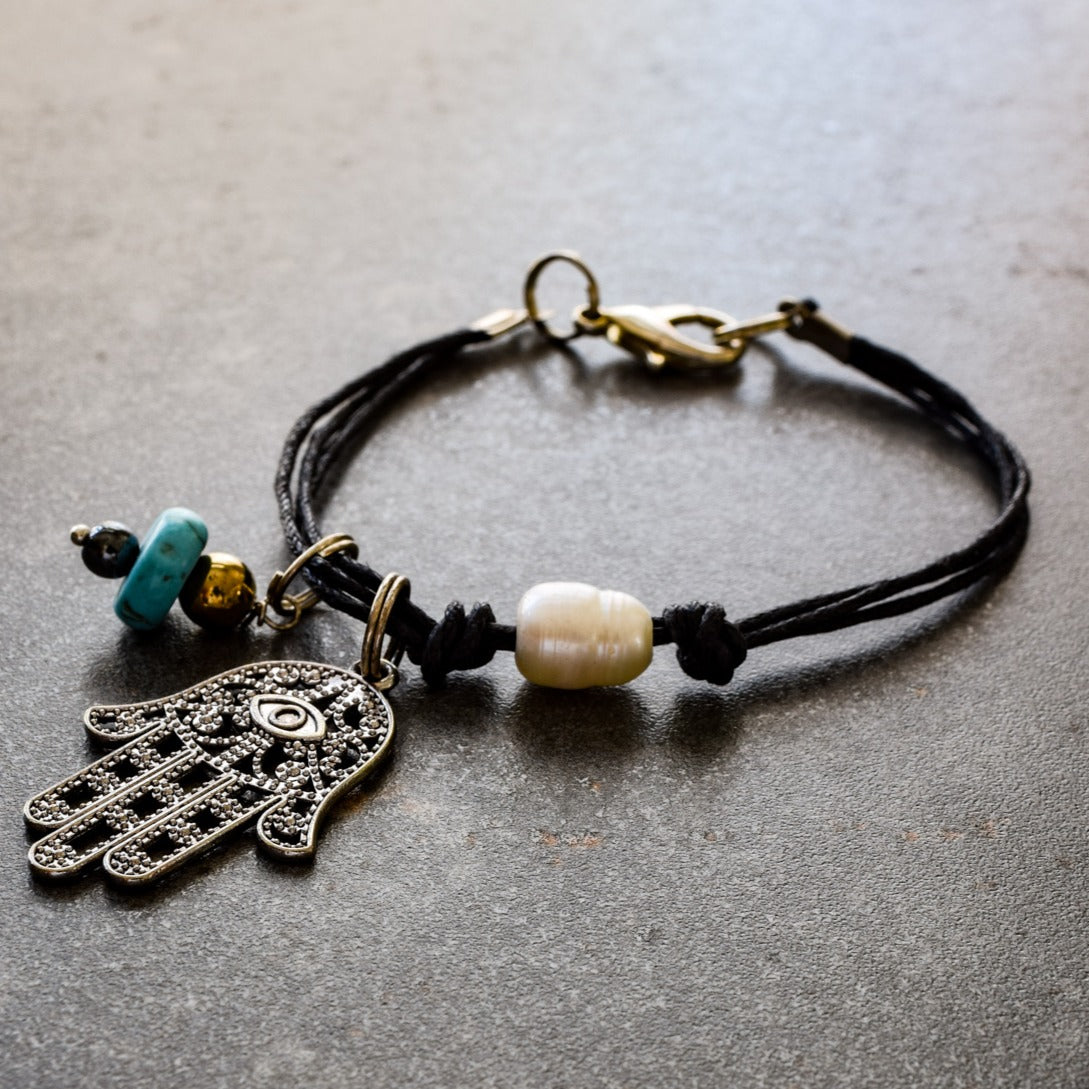 Istanbul, Black Corded Bracelet with Silver Filigree Hamsa, Turquoise, Hemitite, and a Fresh Water Pearl